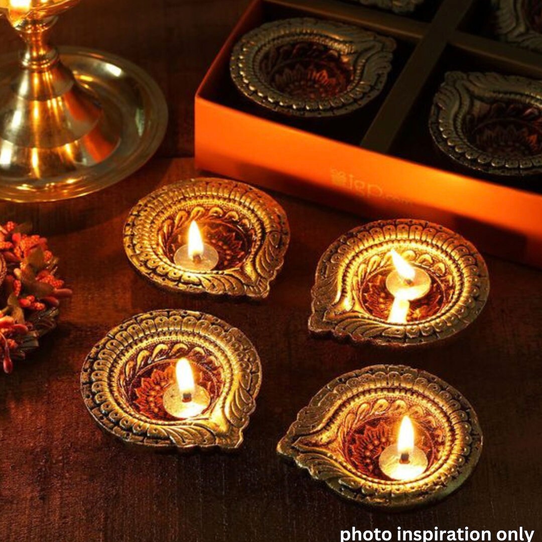 Handmade fortune teller gold and black velvet bead Diwali bindis in a pink glitter box